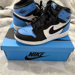 Nike Blue and Black Sneakers with High-Top Design and Perforated Toe Box
